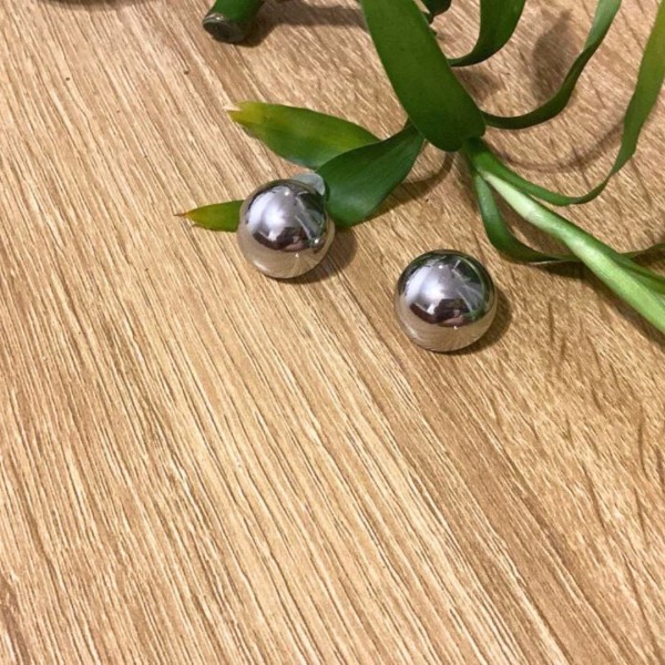 Orecchini bottone a clip in...